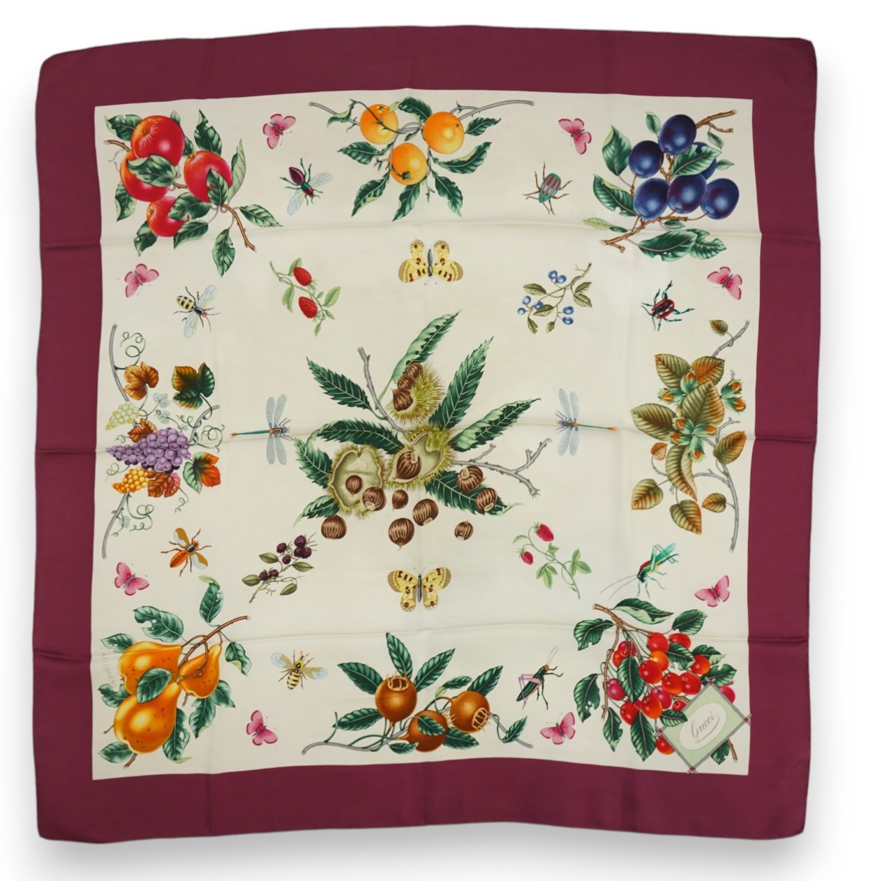 A Gucci Vittorio Accornero silk scarf with fruits and insects design, 87 x 86cm